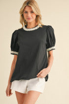 Black Top with Cream Swirl Trim