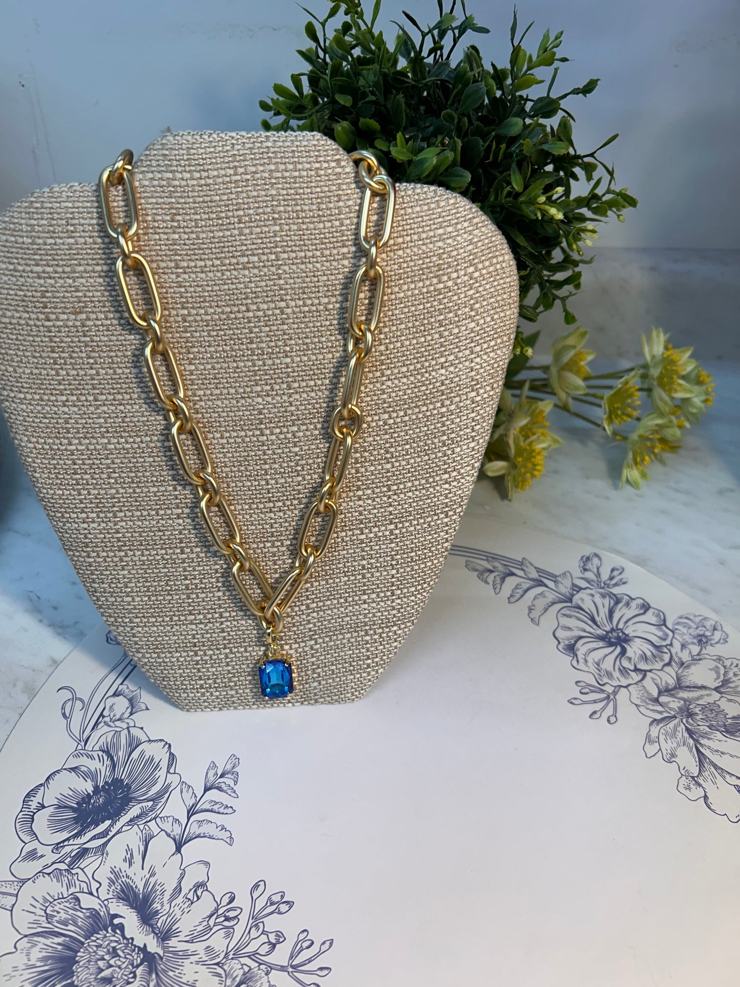 Matte Gold Necklace with Blue Crystal Pendant