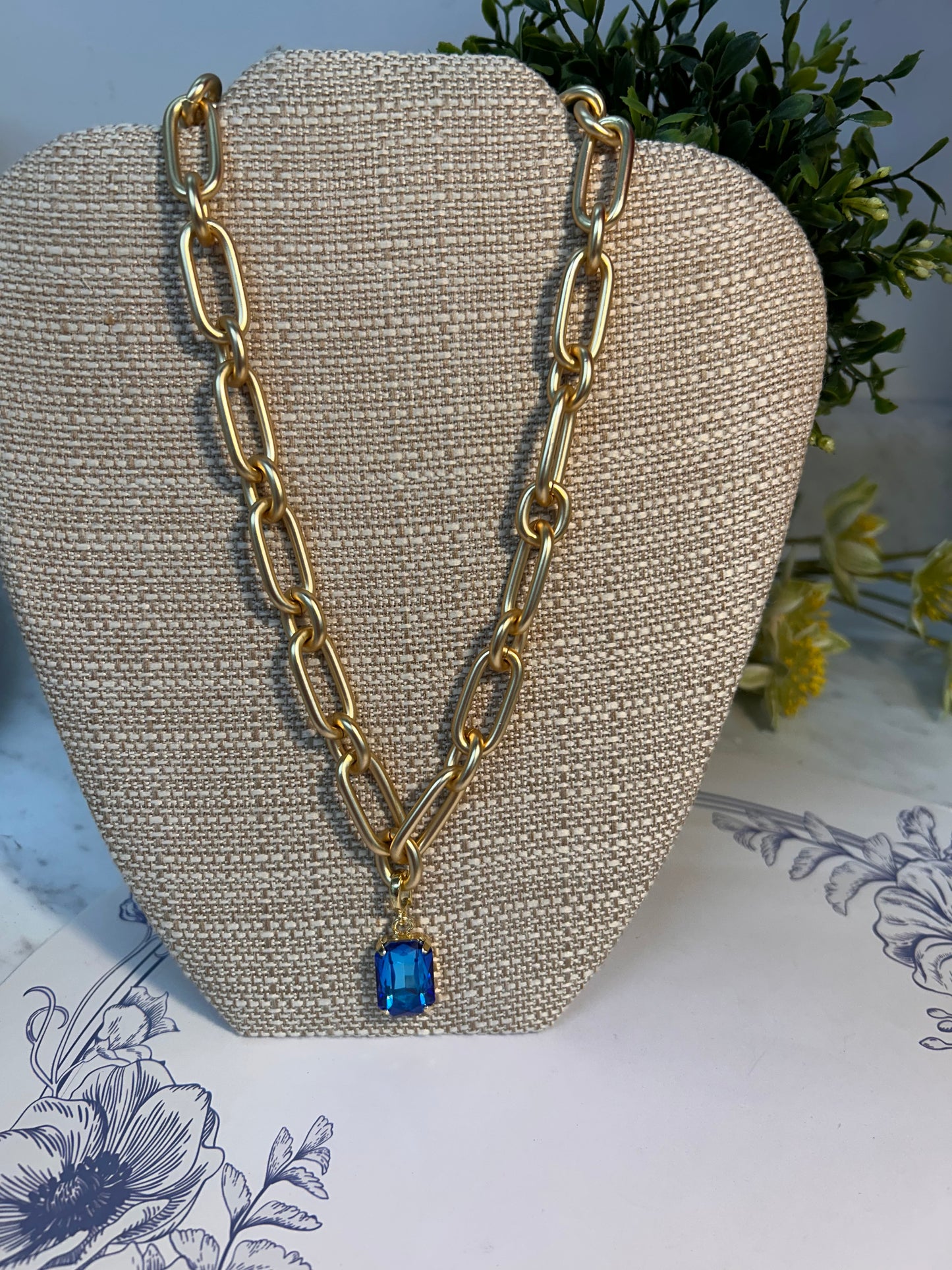 Matte Gold Necklace with Blue Crystal Pendant