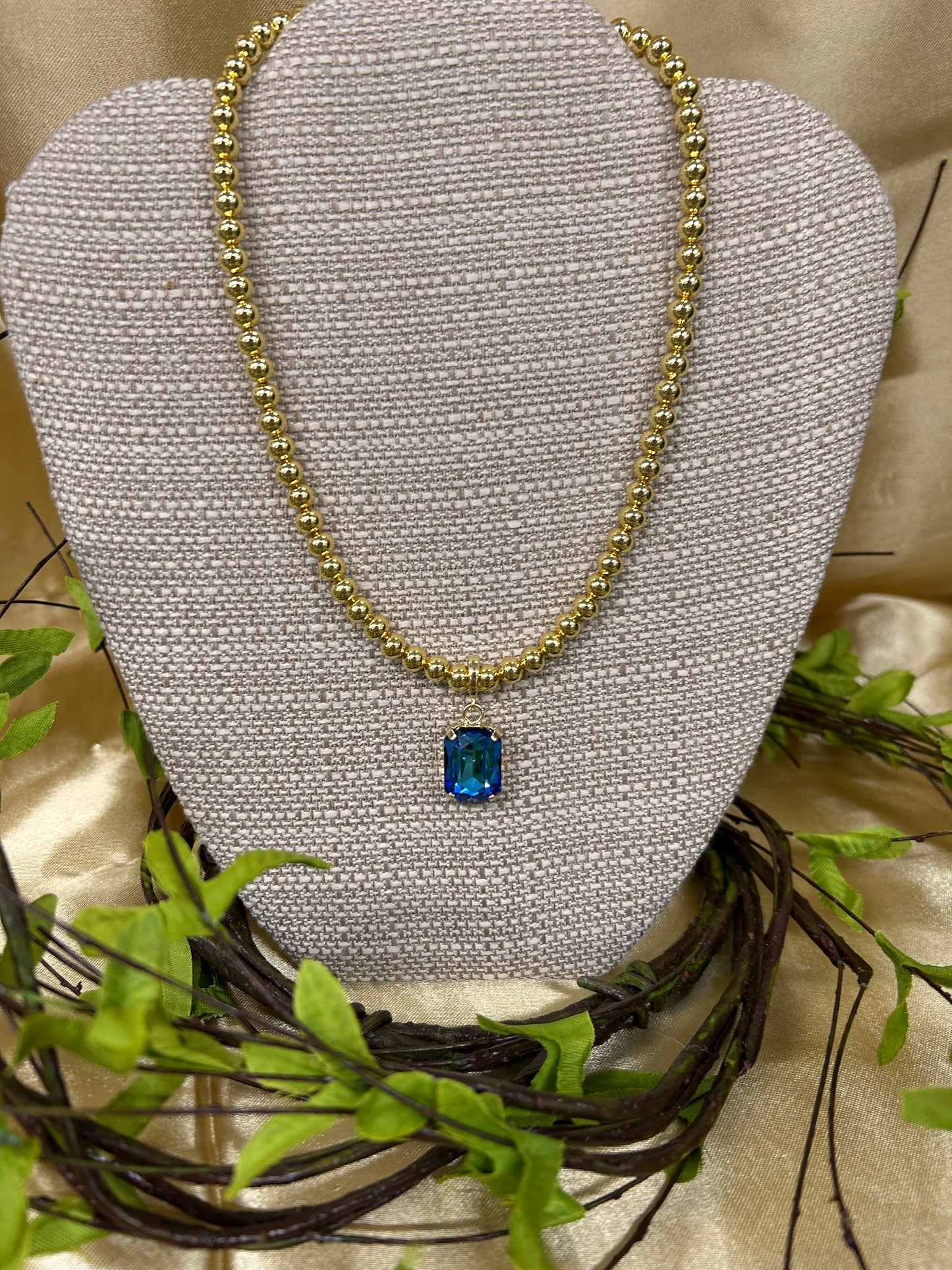 Gold Beaded Necklace with Charm