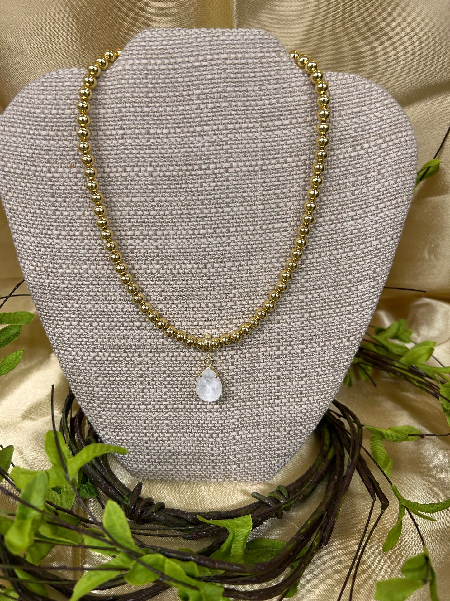 Gold Beaded Necklace with Charm