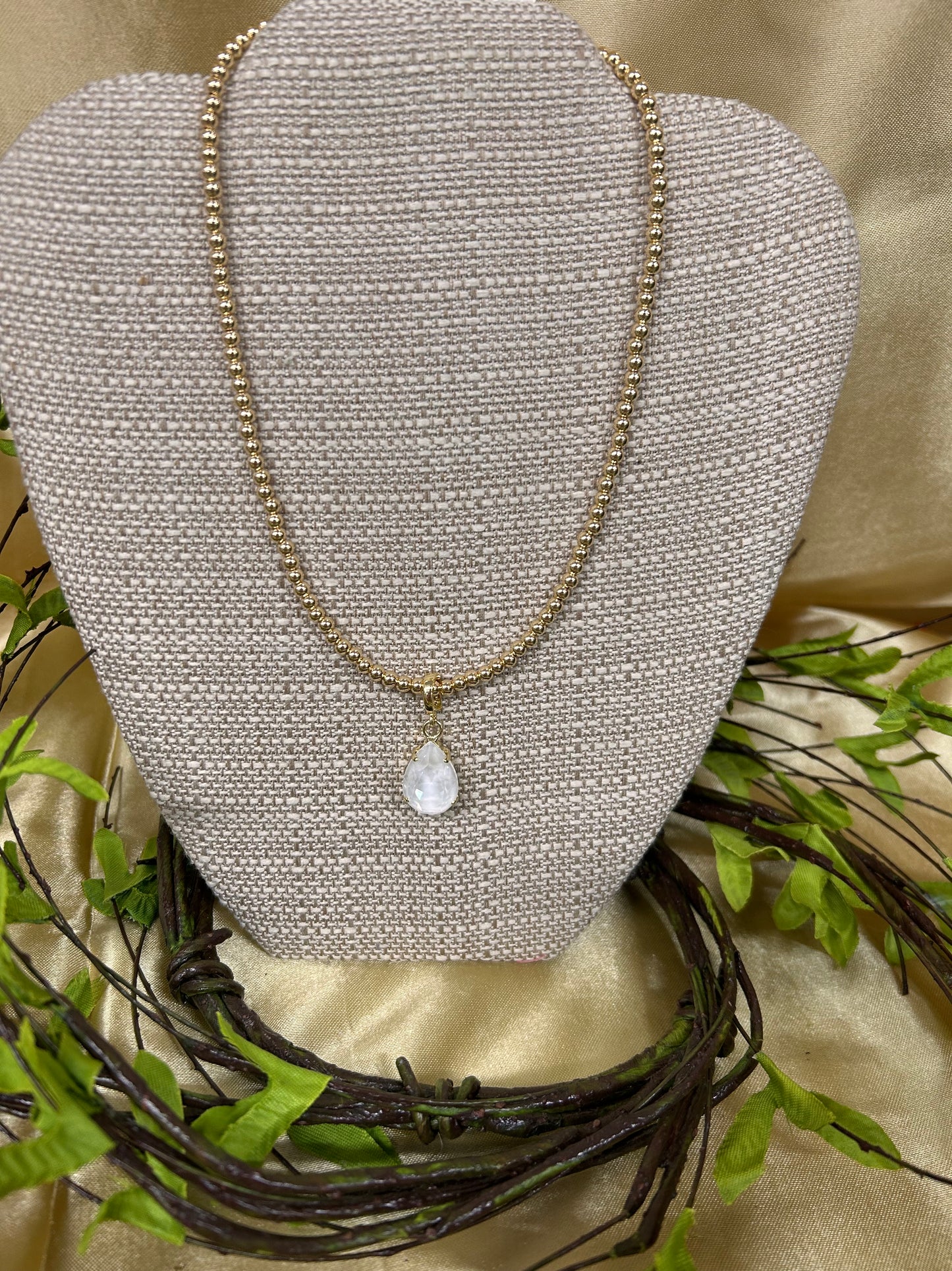 Small Gold Beaded Necklace with Charm